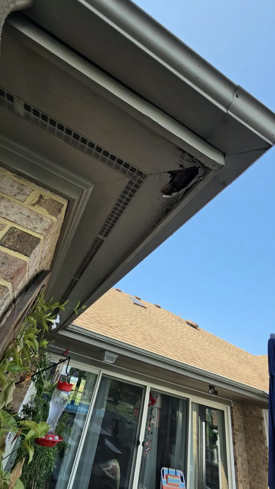 Gutter and soffit roofline view from below in Hampton, VA
