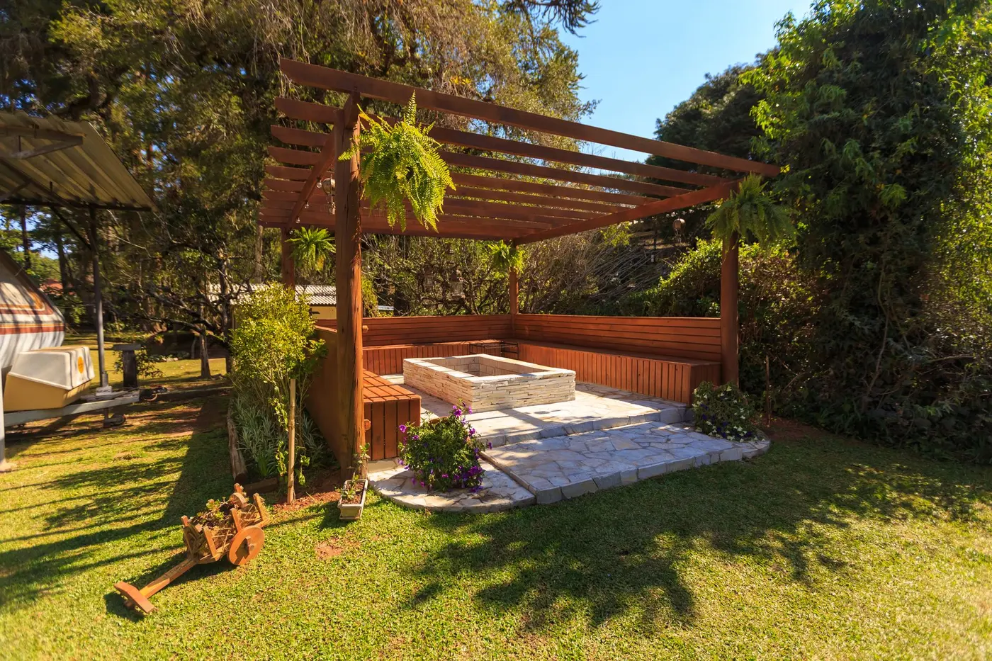 Backyard garden with a wood pergola, landscaping in Hampton, VA